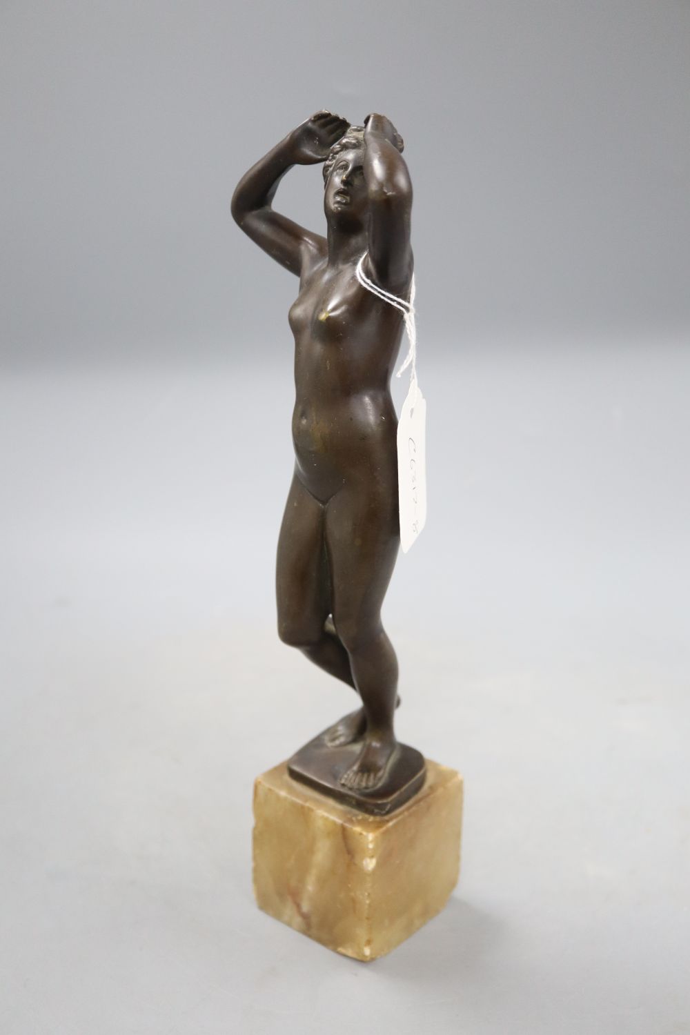 After the antique. A bronze figure of Aphrodite, signed Cartinet, overall height 30.5cm